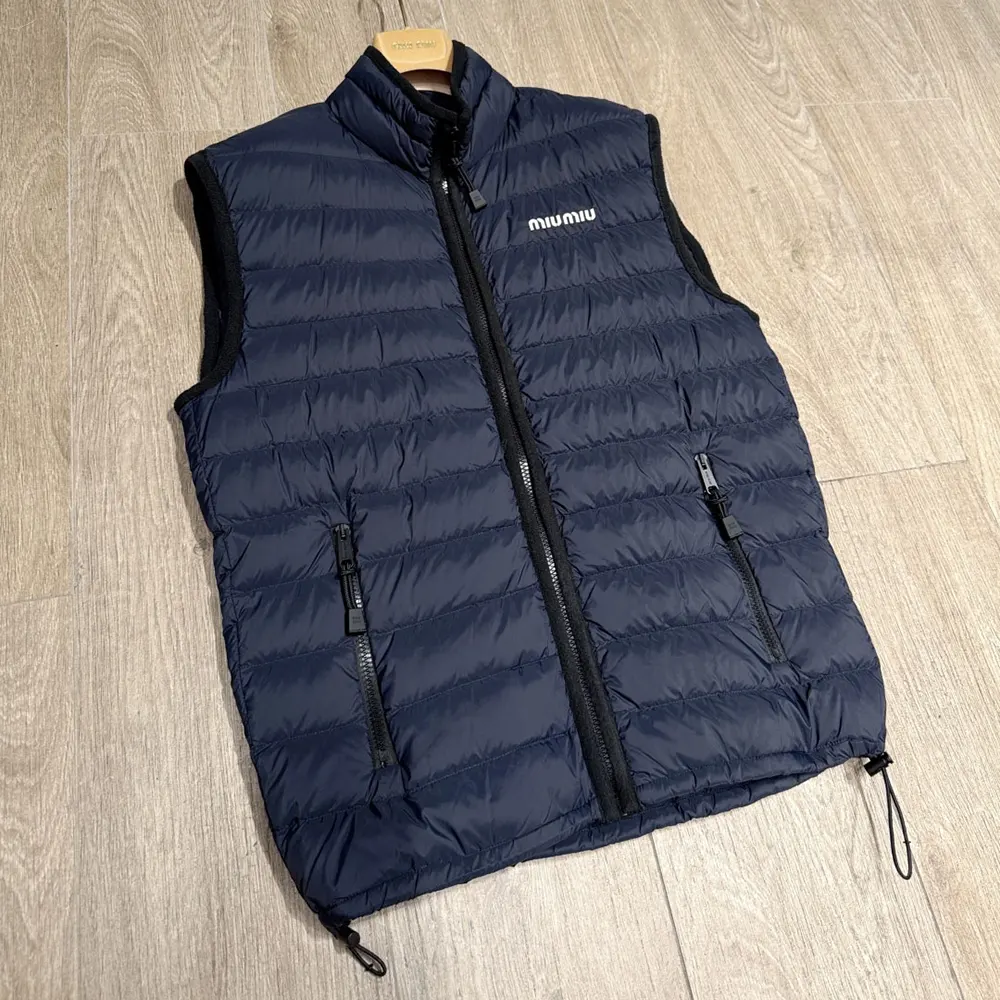 Miu Miu Women Light Pongé Down Vest with Embroidered logo ML1345