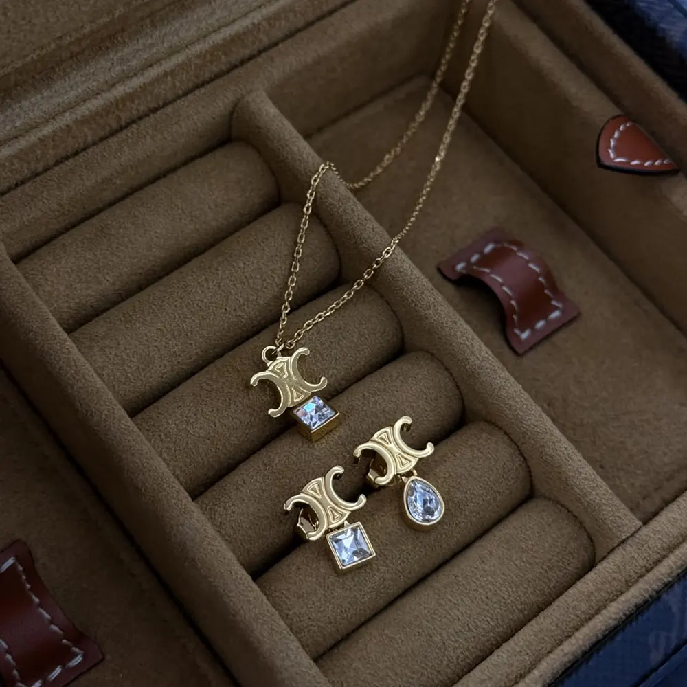 Celine Women Triomphe Twinkle Earrings in Strass and Brass with Gold Finish