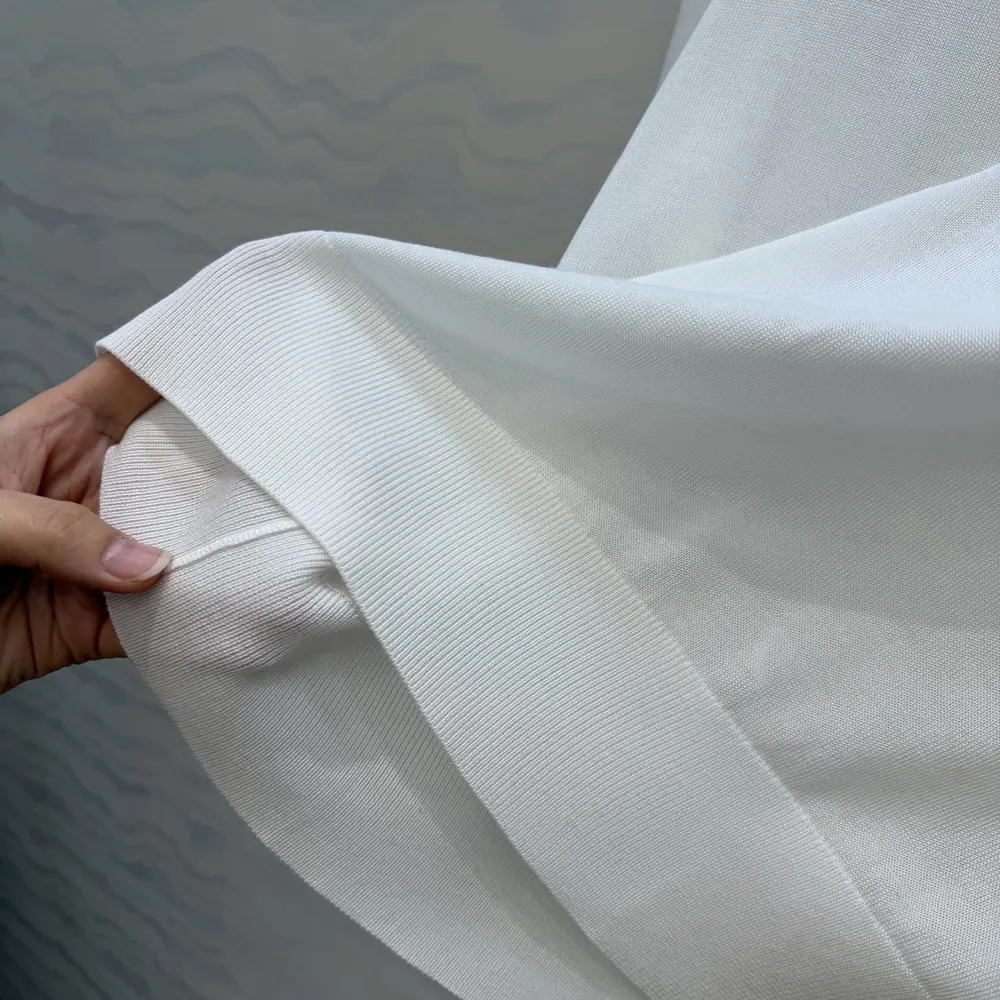 Dior Men Short-Sleeved Fitted Sweater White Wool Knit with Green and Black Dior Clover Signature