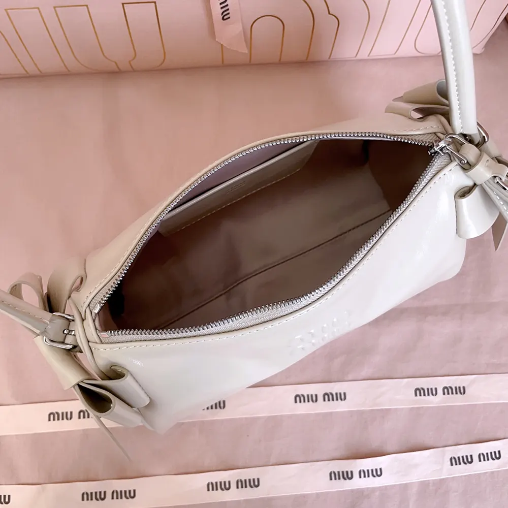 Miu Miu Women Shiny Leather Pouch-Pink 5NE0292A44F0485