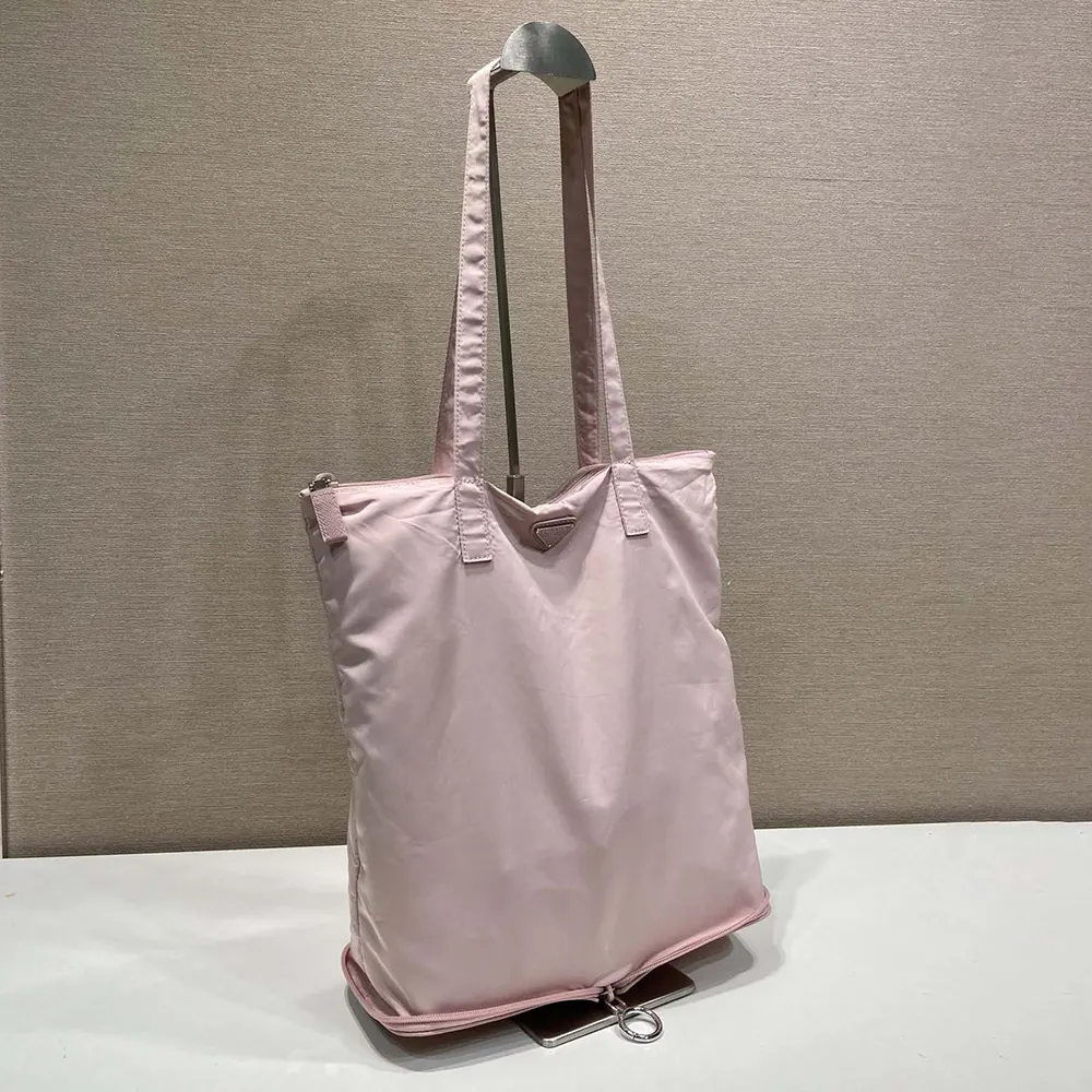 Prada Women Saffiano Leather Pendant With Re-Nylon Tote Bag-Peach 1TT330